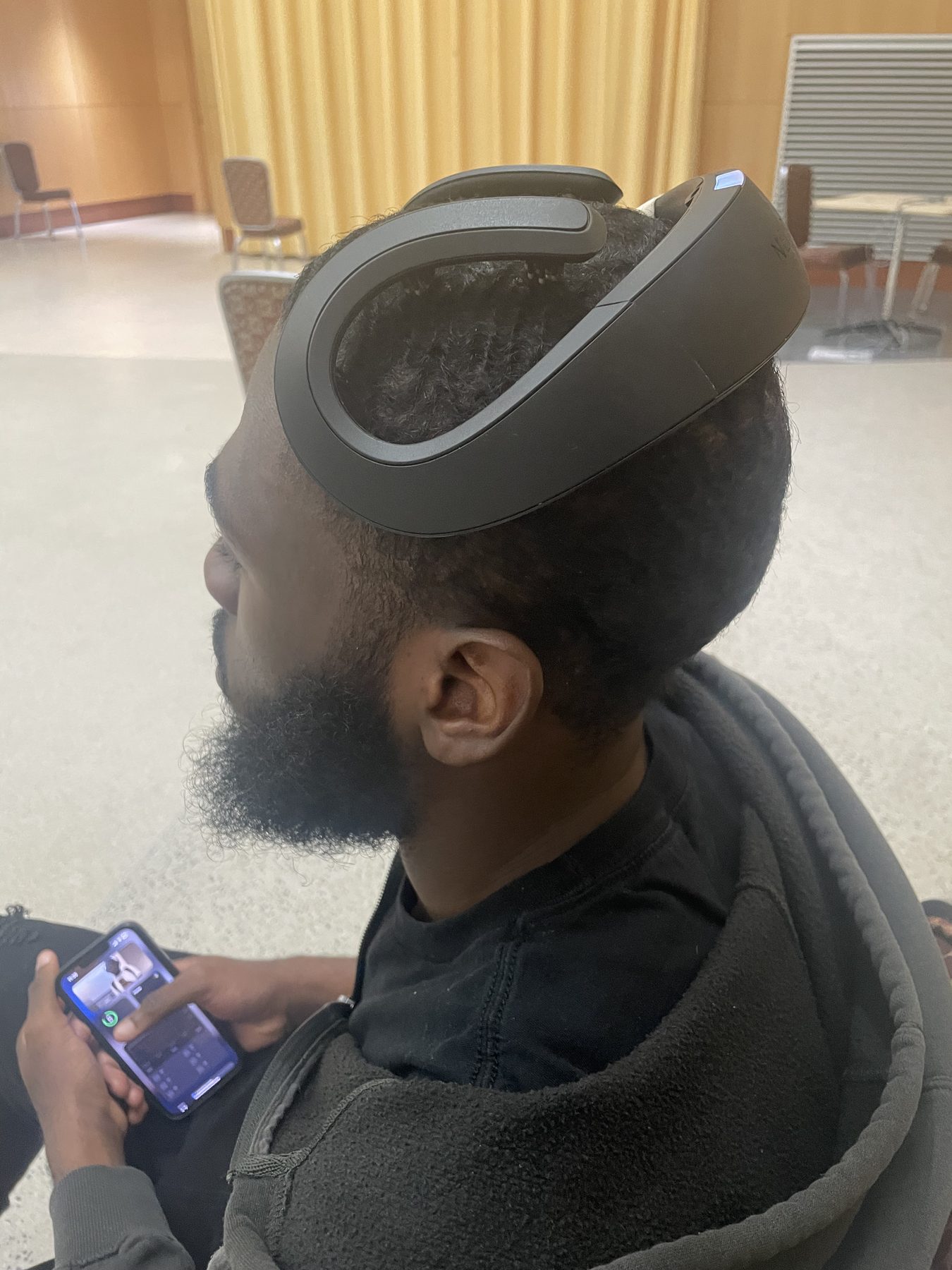 Daniel Onyejiekwe wearing a brain-computer interface headset